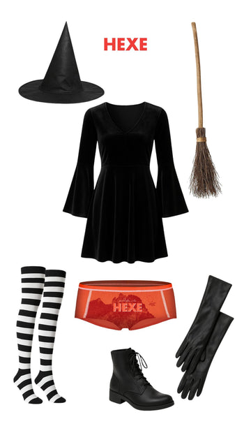 Schwarzer Hexenhut, schwarzes Kleid mit Trompetenärmeln, Besen, gestreifte schwarz-weiße Kniestrümpfe, rote Unterhose mit Aufdruck HEXE, schwarze Handschuhe und schwarze Stiefeletten auf grauem Hintergrund mit Fledermausmuster